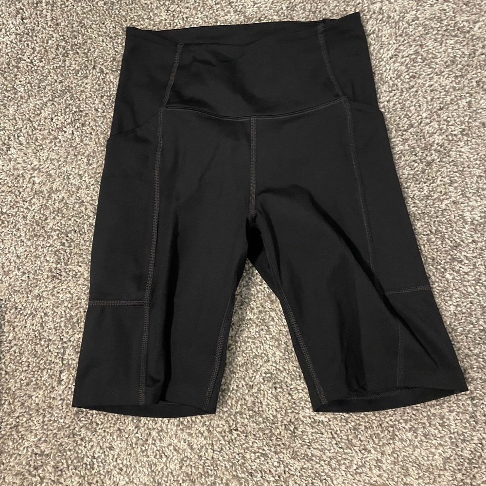 Girlfriend Collective high rise bike shorts with pockets
